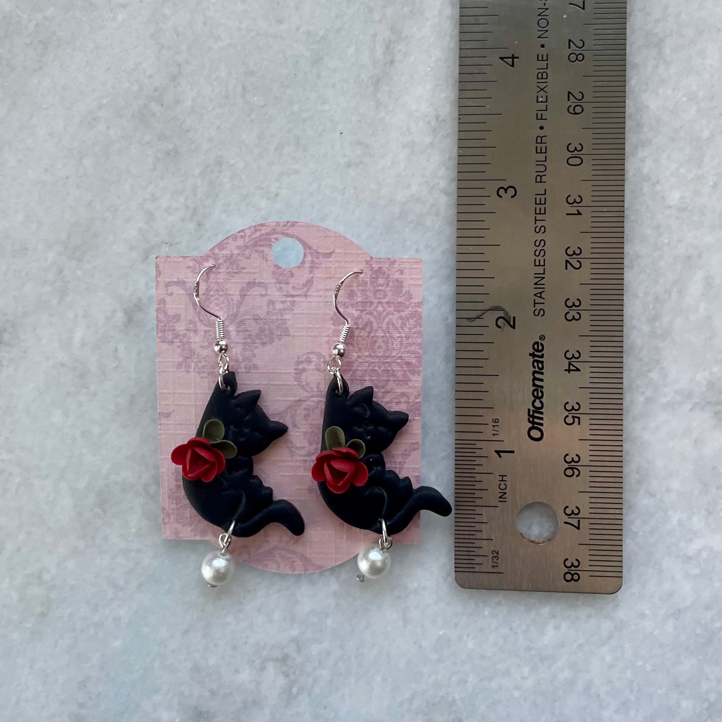 Black Hanging Cats