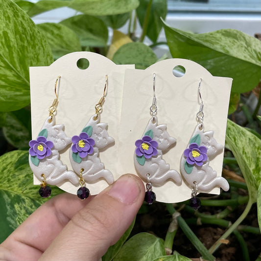 White Hanging Cats